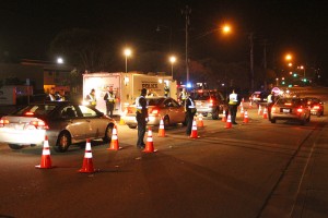 Officers line up so they can quickly process the drivers and get them going once again. The Command Center is seen in the background.