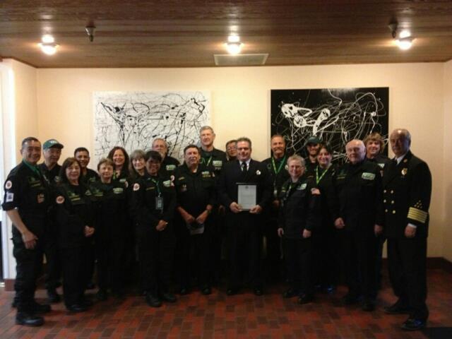 Photo: Chief Phil White and CERT Director Ken Anderson with the SSFCERT after being recognized by City Council
