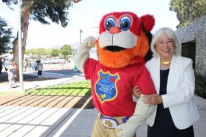 Mayor Matusmoto poses with Kaiser Permanente's Educational Theater Mascot NutraBeast