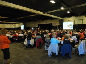 Congresswoman Speier watches the presentation behind the crowd of over 700 attendees Photo: KAISER