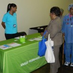 Kaiser representative Leslie Martin interacts with seniors  Photo: KAISER