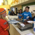 North Peninsula Food Pantry Volunteers Mariden Intengan, Sun Young Park, Maria-Cecilia Bombasi