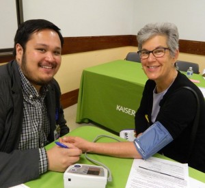 Arnold Digadice from KPSSF takes Elaine Porter's BP