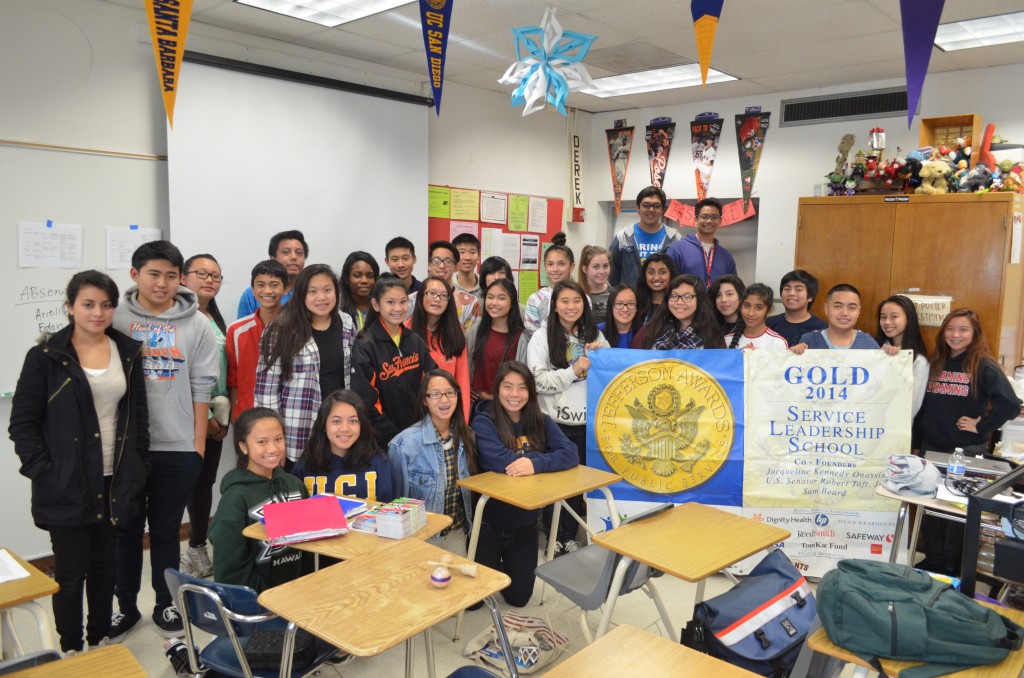 SIA Members holding their Gold Banner awarded last year (Yearbook Photo)