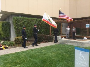 Vice Mayor Addeigo and Kaiser's Gary Simms watch as the SSFPD Color Guard starts off the ceremony