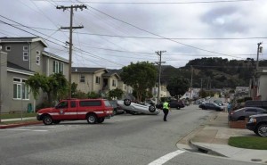 Flipped car at Orange & Commercial Avenue