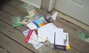 Neighbors are tired of unwanted newspapers and other marketing material left at their homes  Photo credit; redeyechicago