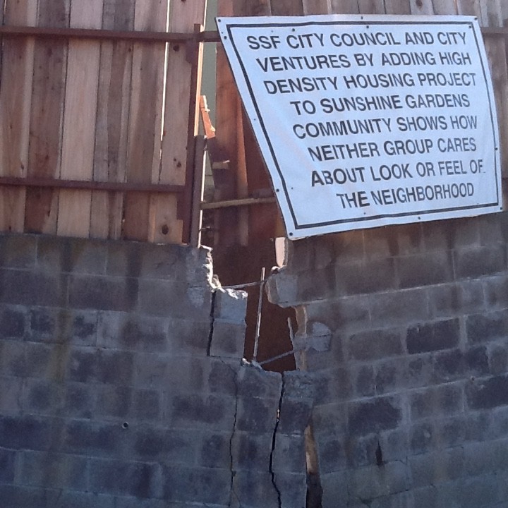 This sign echoes neighbor concerns as the retaining wall eventually collapsed. 