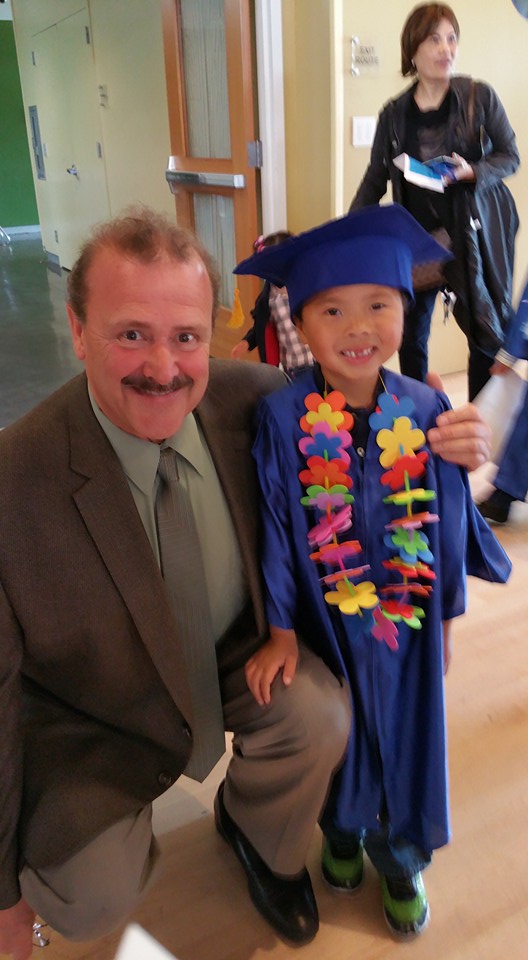 Mayor Mark Addiego with Pre-K student during graduation Photo: Leonard Eng