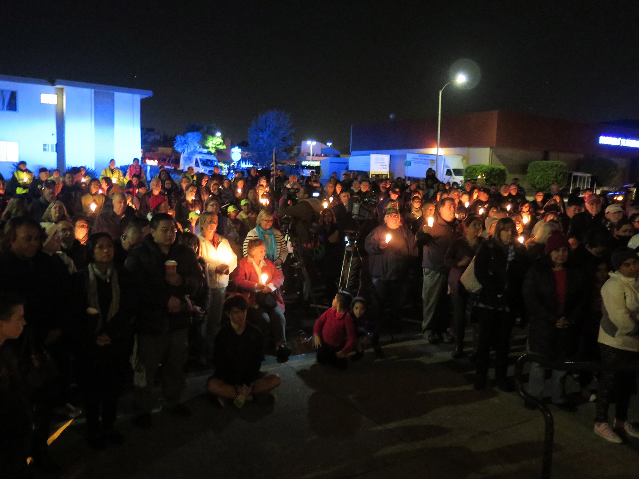 Neighbors lit candles in support of Officer Chon's full and quick healing.  Photo: SSFPD