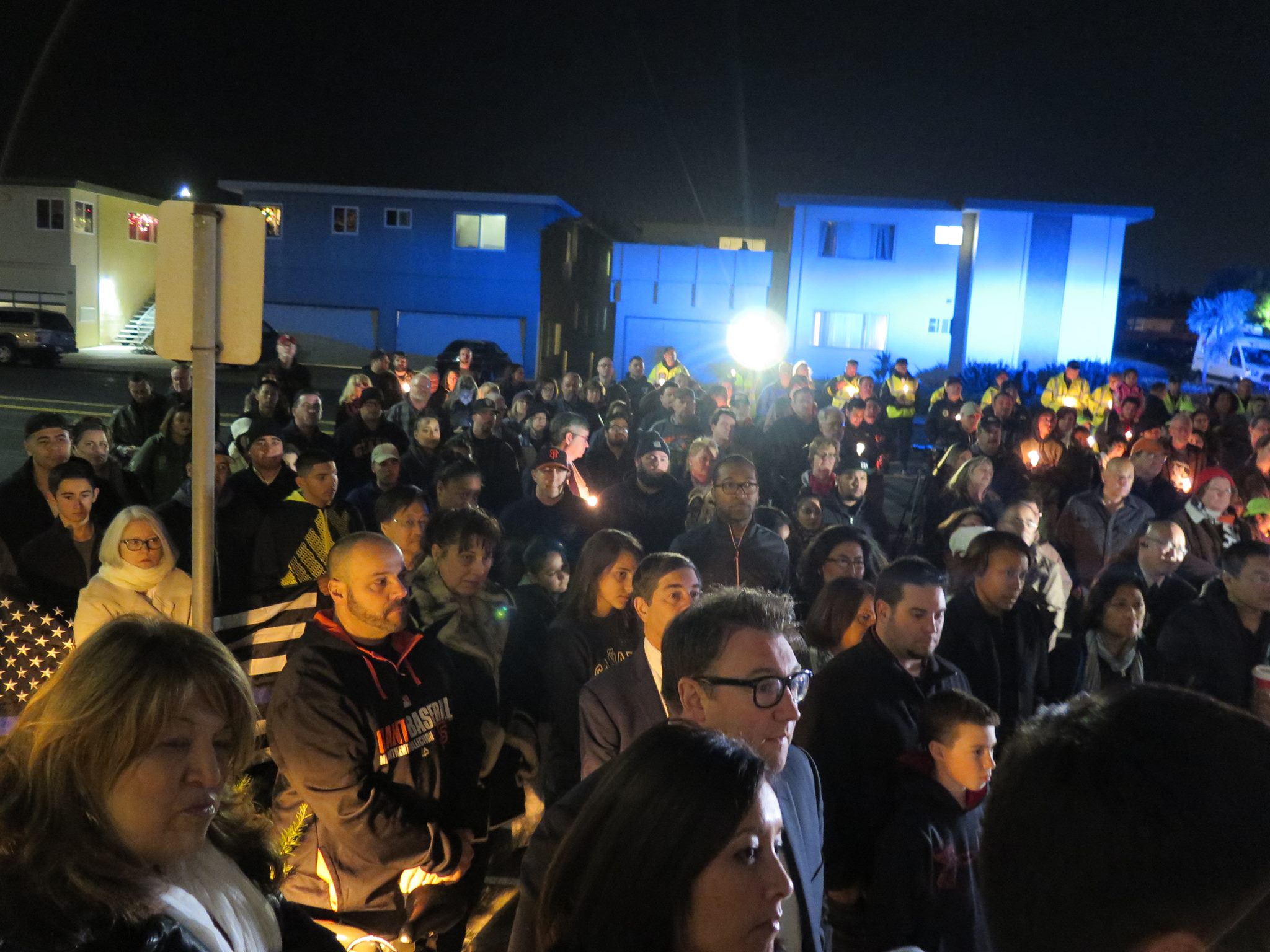 Not knowing the size of the crowd in advance, only 150 candles were available to pass out.<br /> Photo: SSFPD