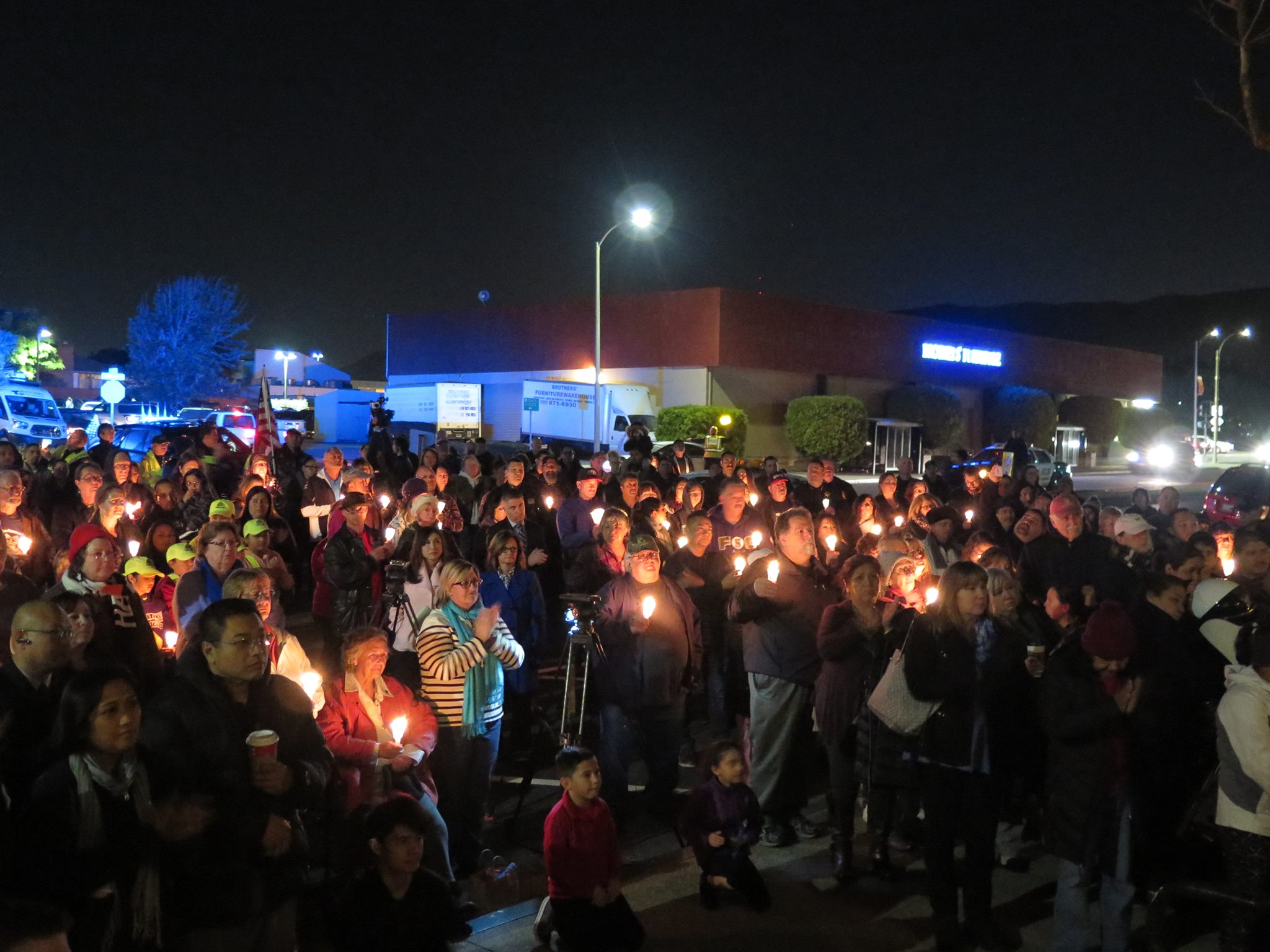 Not knowing the size of the crowd in advance, only 150 candles were available to pass out.  Photo: SSFPD