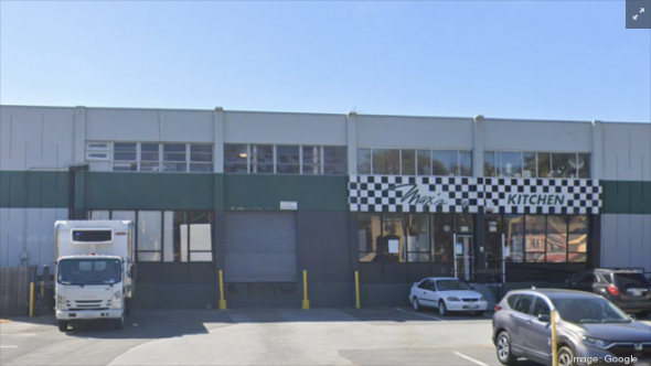 A 21,900-square-foot warehouse at 120 East Grand Ave. is among four sites that Trammell Crow is working to redevelop.