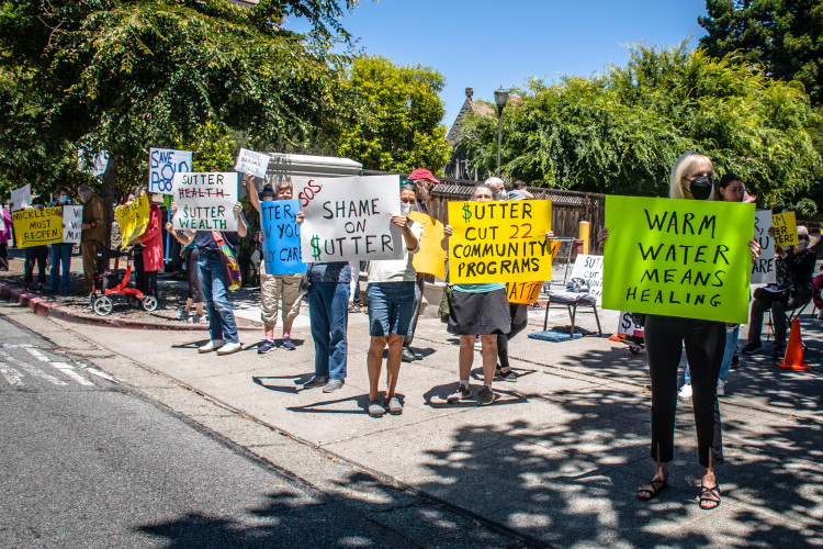 People on the street holding placards