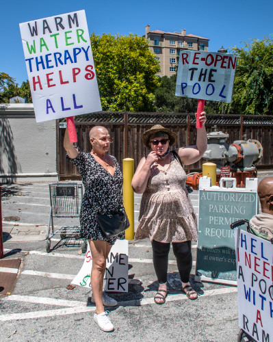 Women holding placards