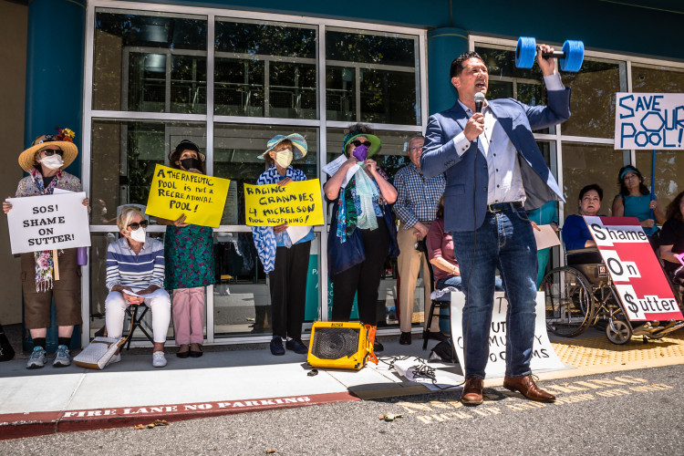 People protesting in front of a building