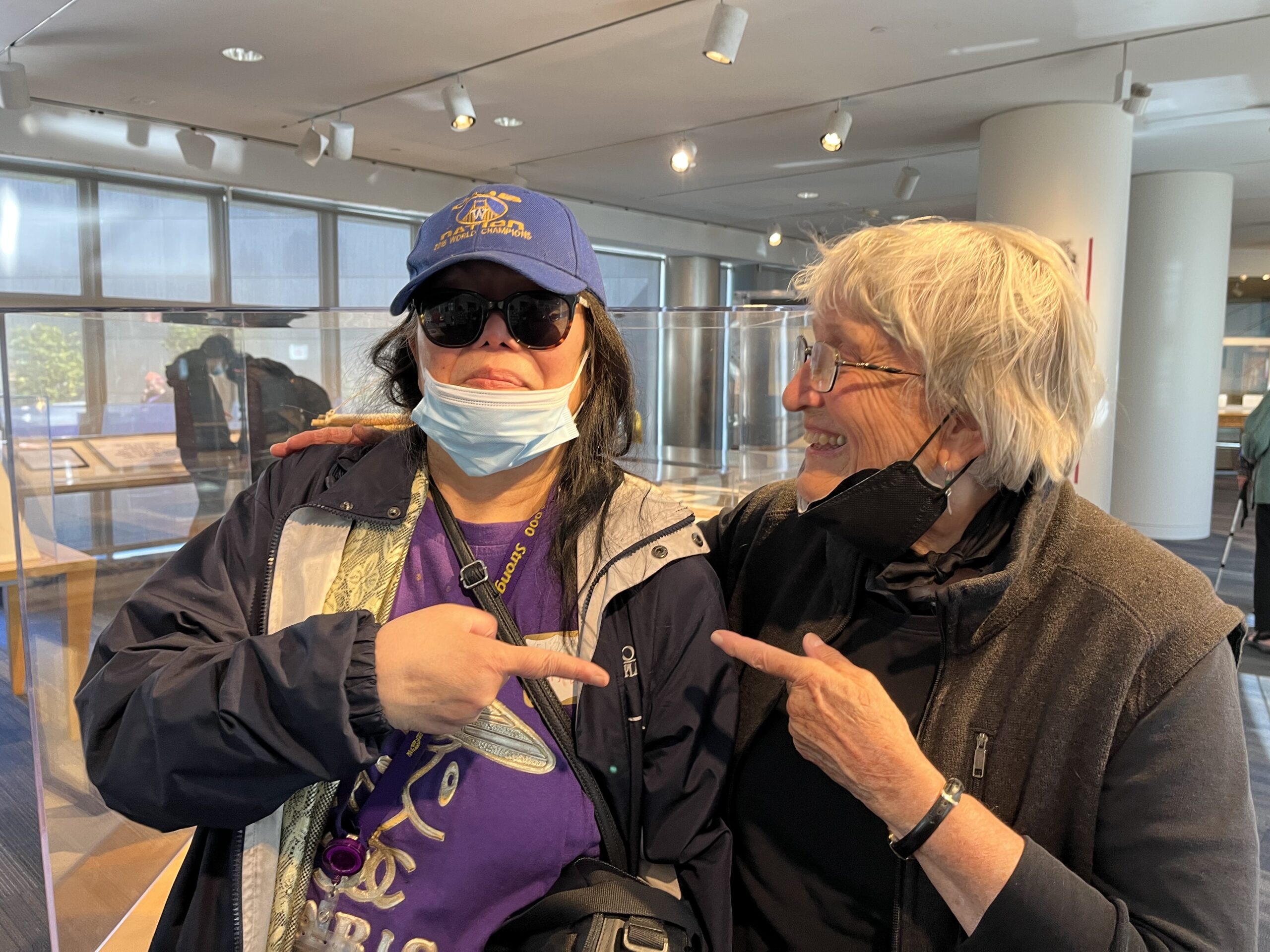 Two women wearing jackets