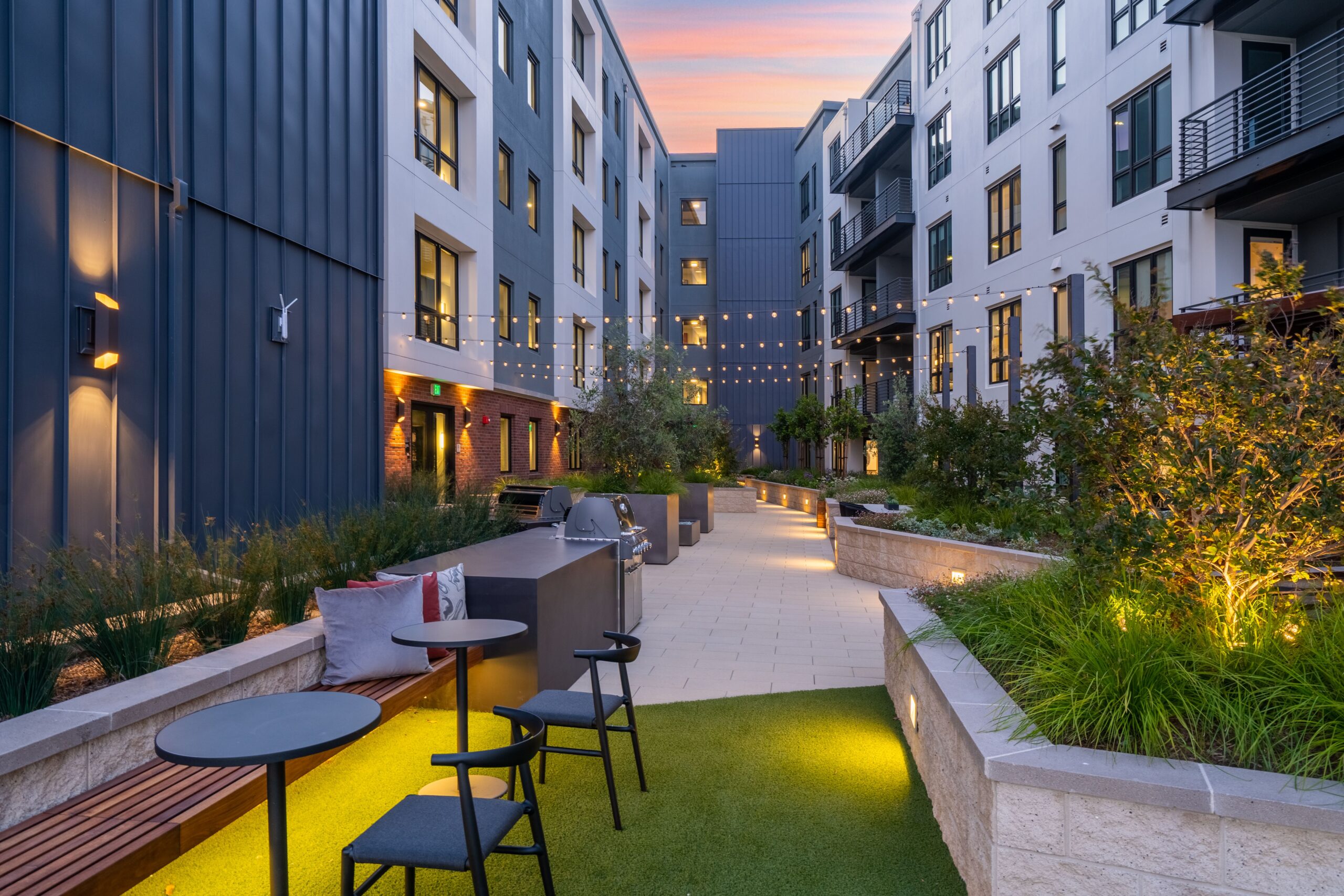 Tables and chairs between two buildings