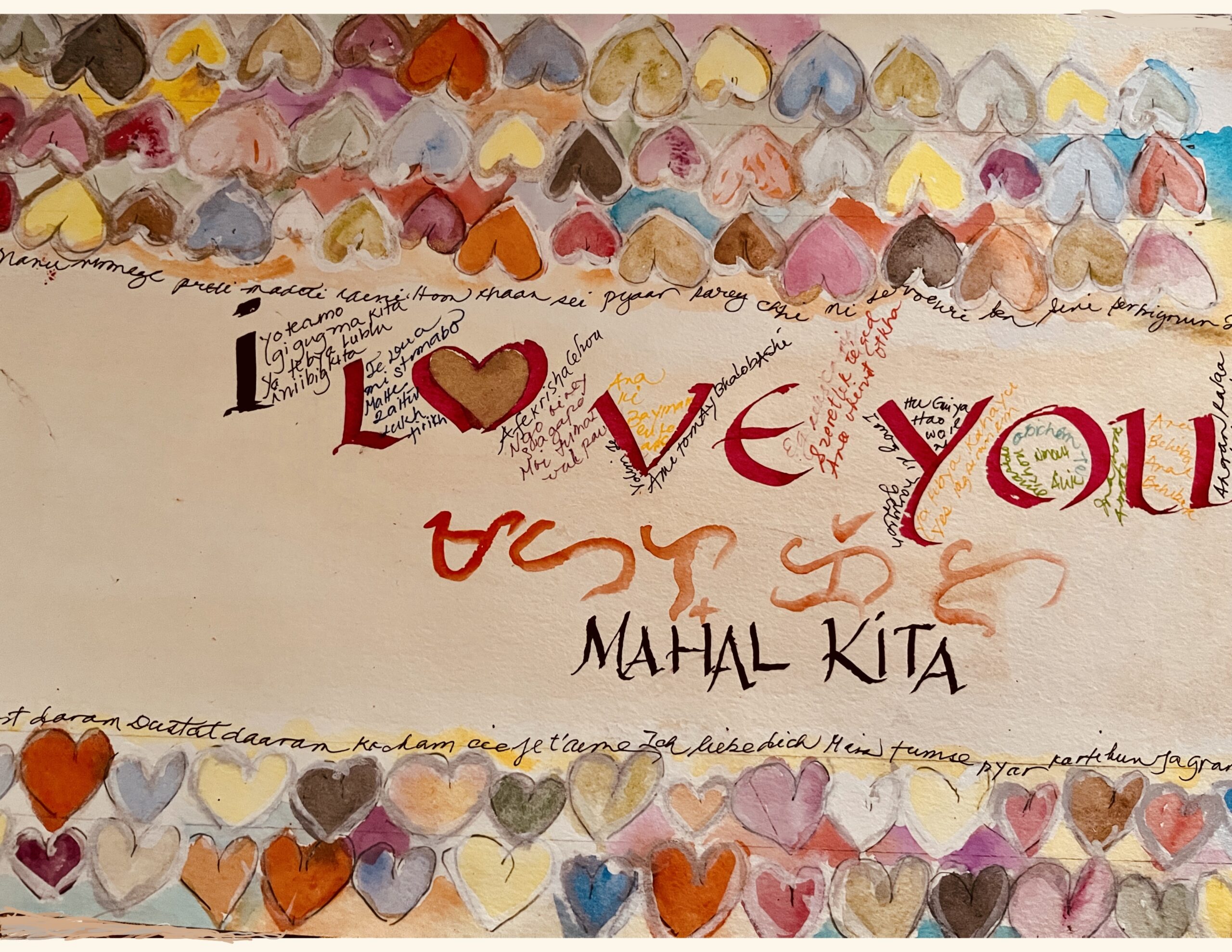 A paper with little hearts as outline and the words “I love you. Mahal kita.”