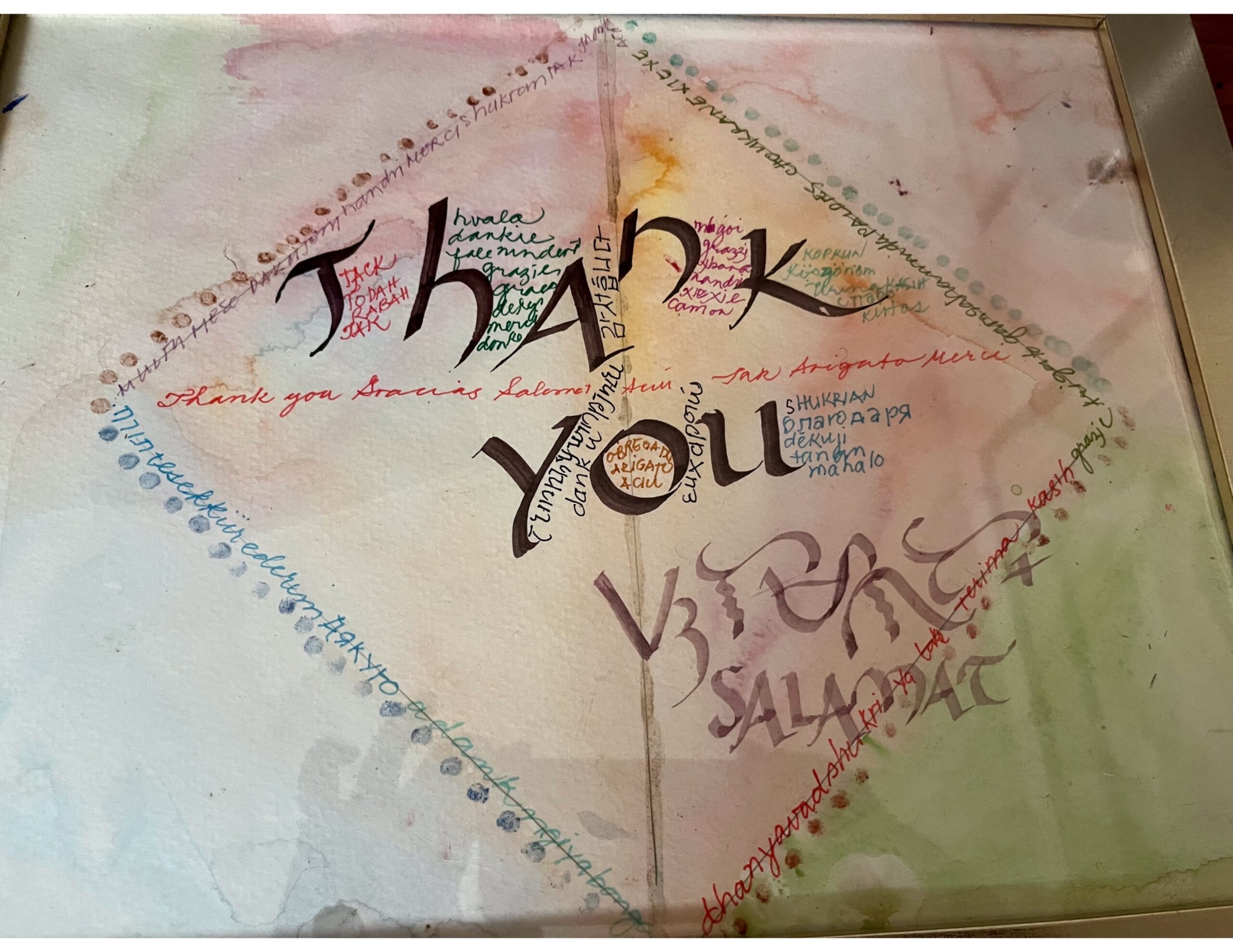 A paper with a diamond drawing and people’s messages. “Thank you. Salamat.”