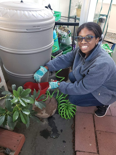 Shaleen of Redwood City with her 50-gallon rain barrel.